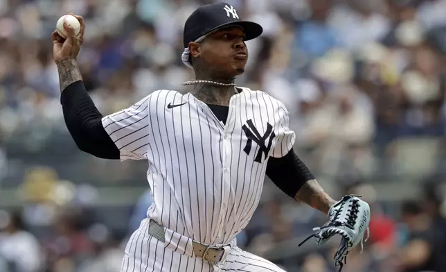 New York Yankees pitcher Marcus Stroman throws during the first inning of a baseball game against the Athletics, Sunday, June 29, 2025, in New York. (AP Photo/Adam Hunger)