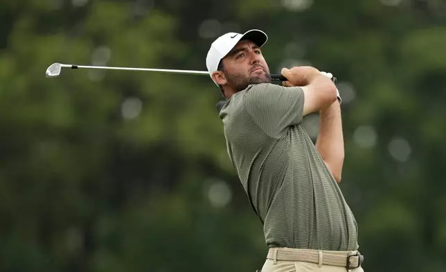 Scottie Scheffler tees off on the 16th hole during the second round of the U.S. Open golf tournament at Oakmont Country Club Friday, June 13, 2025, in Oakmont, Pa. (AP Photo/Carolyn Kaster)