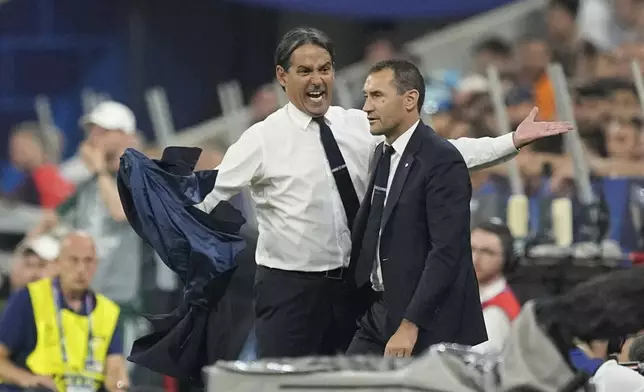 Inter Milan's head coach Simone Inzaghi reacts during the Champions League final soccer match between Paris Saint-Germain and Inter Milan at the Allianz Arena in Munich, Germany, Saturday, May 31, 2025. (AP Photo/Martin Meissner)