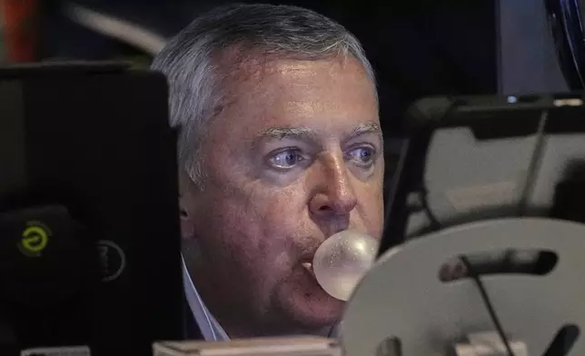 Trader James Lamb works on the floor of the New York Stock Exchange, Monday, June 9, 2025. (AP Photo/Richard Drew)