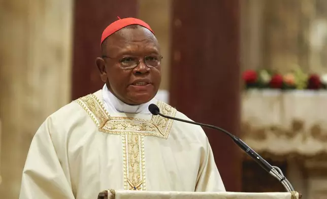 Cardinal Fridolin Ambongo Besungu speaks during a Mass for the beatification of Floribert Bwana Chui Bin Kositi, a Congolese man killed in 2007 for fighting corruption, in St. Paul Outside the Walls' Basilica, in Rome, Sunday, June 15, 2025. (AP Photo/Riccardo De Luca)
