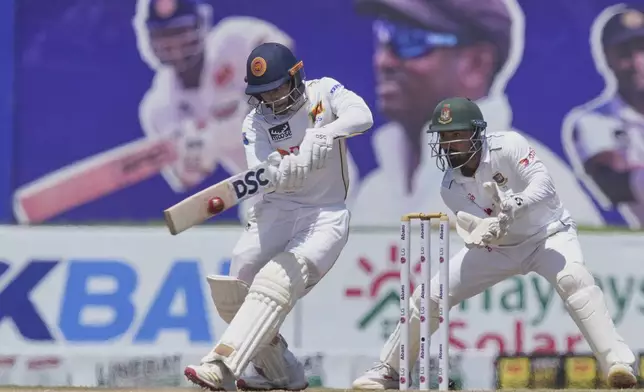Sri Lanka's Pathum Nissanka plays a shot during day three of the first cricket test match between Sri Lanka and Bangladesh in Galle, Sri Lanka, Thursday, June 19, 2025. (AP Photo/Eranga Jayawardena)