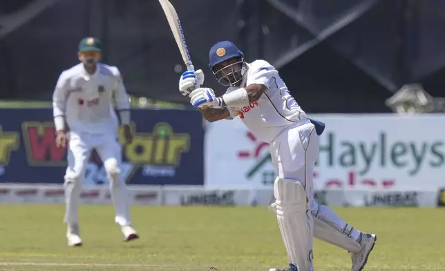 Sri Lanka's Lahiru Udara plays a shot during day three of the first cricket test match between Sri Lanka and Bangladesh in Galle, Sri Lanka, Thursday, June 19, 2025. (AP Photo/Eranga Jayawardena)