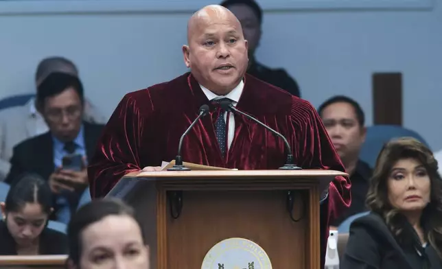 In this photo provided by the Senate Social Media Unit, Philippine Senator Ronald dela Rosa speaks after taking oath as jurors in the impeachment trial of Vice President Sara Duterte at the Philippine Senate in Pasay city, Philippines on Tuesday June 10, 2025. (Senate Social Media Unit, Voltaire Fernandez Domingo via AP)