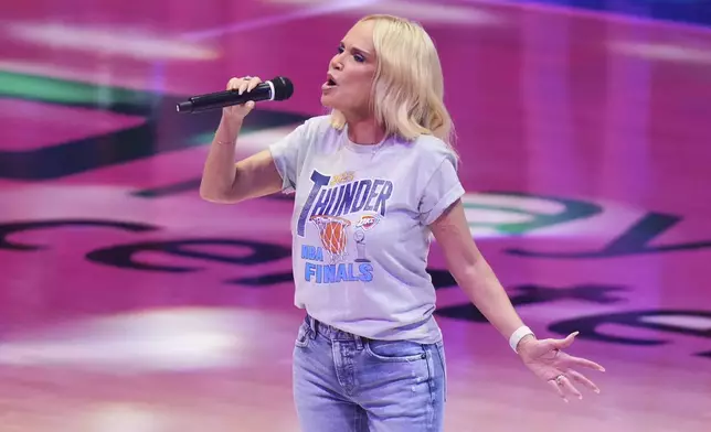 Kristin Chenoweth sings the national anthem before Game 7 of the NBA Finals basketball series between the Indiana Pacers and the Oklahoma City Thunder Sunday, June 22, 2025, in Oklahoma City. (AP Photo/Nate Billings)