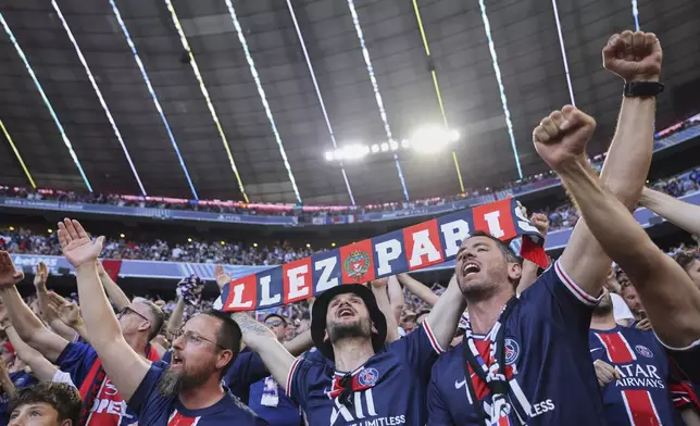 Paris Saint-Germain fans cheers before the Champions League final soccer match between Paris Saint-Germain and Inter Milan at the Allianz Arena in Munich, Germany, Saturday, May 31, 2025. (AP Photo/Alexandra Beier)