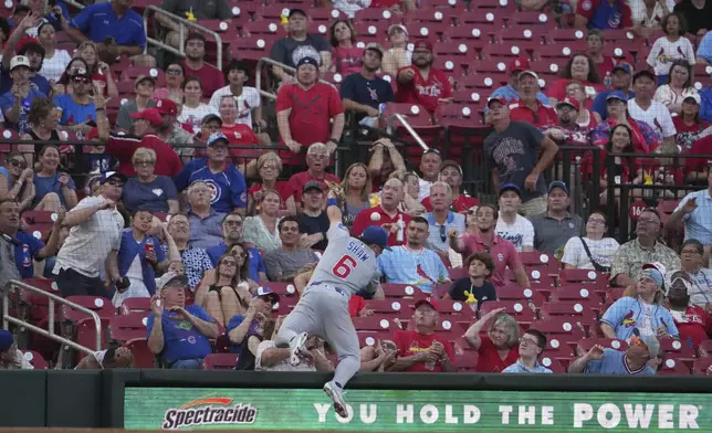 Chicago Cubs third baseman Matt Shaw is unable to catch a foul ball by St. Louis Cardinals' Nolan Gorman during the fourth inning of a baseball game Tuesday, June 24, 2025, in St. Louis. (AP Photo/Jeff Roberson)