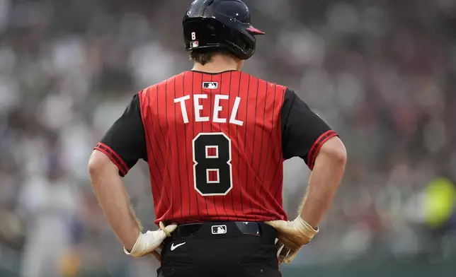 Chicago White Sox's Kyle Teel (8) stands on first base after hitting a single during the fourth inning of a baseball game against the Kansas City Royals, Friday, June 6, 2025, in Chicago. (AP Photo/Erin Hooley)