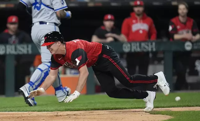 Chicago White Sox's Kyle Teel (8) slides into home to score on a wild pitch from Kansas City Royals pitcher Taylor Clarke (45) during the eighth inning of a baseball game Friday, June 6, 2025, in Chicago. (AP Photo/Erin Hooley)