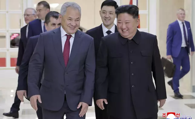 In this photo provided by the North Korean government, North Korean leader Kim Jong Un, front right, meets with Russian Security Council Secretary Sergei Shoigu, left, at the headquarters of the ruling Workers' Party in Pyongyang, North Korea, Tuesday, June 17, 2025. Independent journalists were not given access to cover the event depicted in this image distributed by the North Korean government. The content of this image is as provided and cannot be independently verified. Korean language watermark on image as provided by source reads: "KCNA" which is the abbreviation for Korean Central News Agency. (Korean Central News Agency/Korea News Service via AP)
