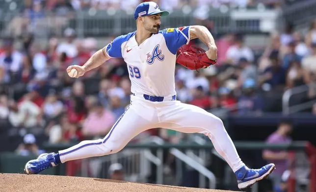 Atlanta Braves pitcher Spencer Strider (99) delivers in the first inning of a baseball game against the Colorado Rockies, Saturday, June 14, 2025, in Atlanta. (AP Photo/Colin Hubbard)