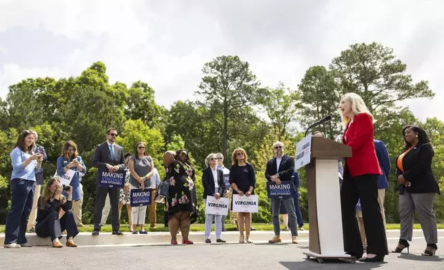 Democratic gubernatorial candidate Abigail Spanberger speaks during a press conference in front of a new housing development in Sandston, Va., Friday, June 6, 2025. (Mike KRopf/Richmond Times-Dispatch via AP)