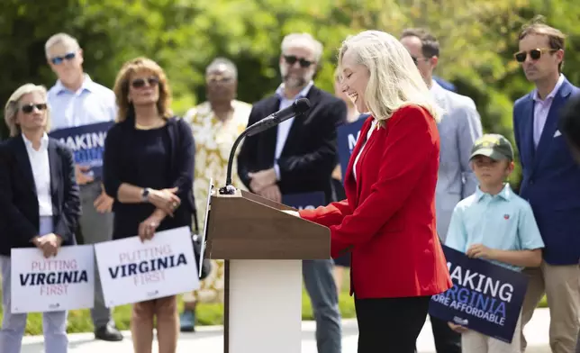 Democratic gubernatorial candidate Abigail Spanberger speaks during a press conference in front of a new housing development in Sandston, Va., Friday, June 6, 2025. (Mike KRopf/Richmond Times-Dispatch via AP)