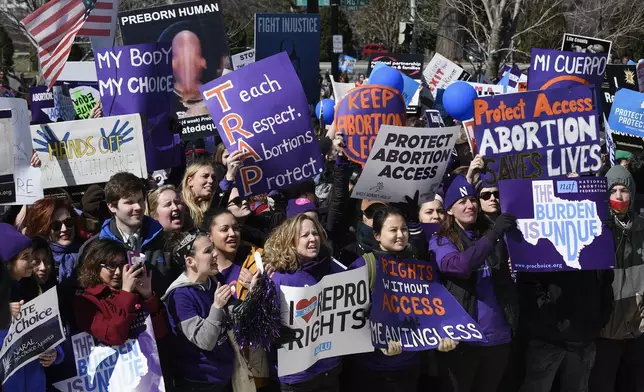 FILE - Pro-abortion rights protesters rally outside the Supreme Court in Washington, Wednesday, March 2, 2016. (AP Photo/Susan Walsh, File)