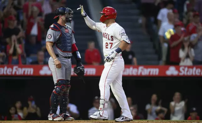 Los Angeles Angels' Mike Trout gestures after hitting a home run during the seventh inning of a baseball game against the Washington Nationals Saturday, June 28, 2025, in Anaheim, Calif. (AP Photo/William Liang)
