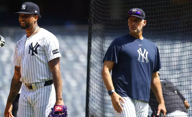 New York Yankees' Luis Gil, left, and Andy Pettitte, right, are on the field during live batting practice before a baseball game between the New York Yankees and the Baltimore Orioles, Saturday, June 21, 2025, in New York. (AP Photo/Noah K. Murray)