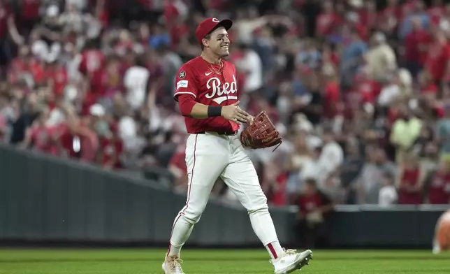 Cincinnati Reds' TJ Friedl celebrates at the conclusion of a baseball game against the Milwaukee Brewers, Tuesday, June 3, 2025, in Cincinnati. (AP Photo/Kareem Elgazzar)