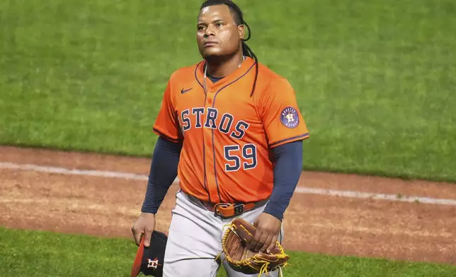 Houston Astros pitcher Framber Valdez walks to the dugout after pitching in the fifth inning of a baseball game against the Pittsburgh Pirates in Pittsburgh, Thursday, June 5, 2025. (AP Photo/Gene J. Puskar)