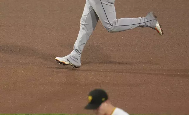 Houston Astros' Isaac Paredes (15) rounds the bases after hitting a solo home run off Pittsburgh Pirates pitcher Mitch Keller (23) during the fourth inning of a baseball game in Pittsburgh, Thursday, June 5, 2025. (AP Photo/Gene J. Puskar)