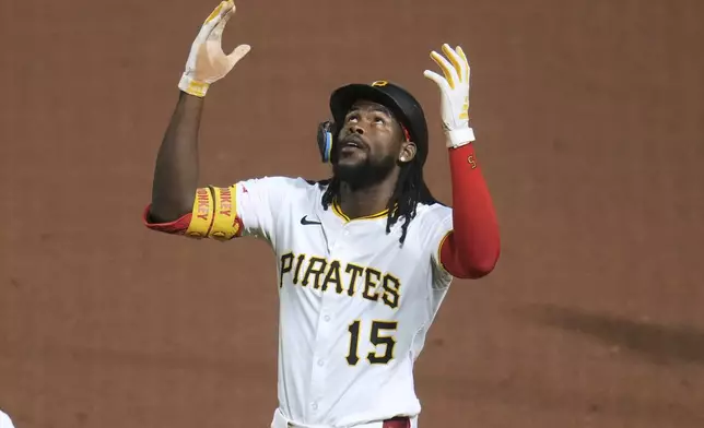 Pittsburgh Pirates' Oneil Cruz celebrates after driving in a run with a single off Houston Astros pitcher Framber Valdez during the fifth inning of a baseball game in Pittsburgh, Thursday, June 5, 2025. (AP Photo/Gene J. Puskar)