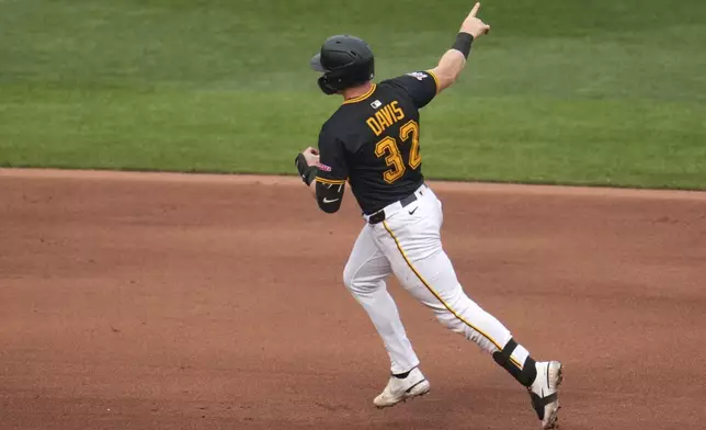 Pittsburgh Pirates' Henry Davis rounds the bases after hitting a solo home run off Philadelphia Phillies pitcher Ranger Suárez during the seventh inning of a baseball game in Pittsburgh, Saturday, June 7, 2025. (AP Photo/Gene J. Puskar)