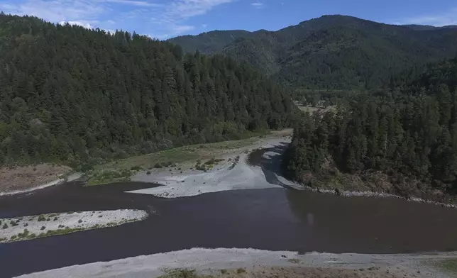 Blue Creek, center, flows into the Klamath River, Thursday, Sept. 19, 2024, in Humboldt County, Calif. (AP Photo/Godofredo A. Vásquez)