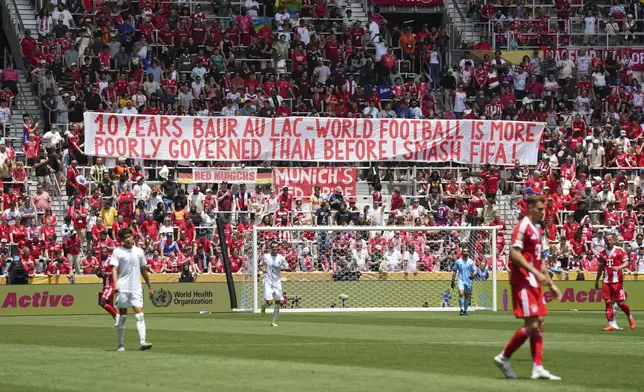 Bayern fans holds anti-FIFA banner during the Club World Cup group C soccer match between Bayern Munich and Auckland City in Cincinnati, Sunday, June 15, 2025. (AP Photo/Jeff Dean)