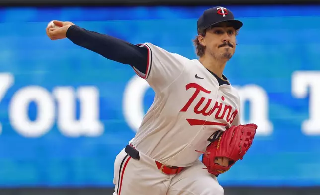 Minnesota Twins starting pitcher Joe Ryan throws to the Seattle Mariners in the first inning of a baseball game Wednesday, June 25, 2025, in Minneapolis. (AP Photo/Bruce Kluckhohn)