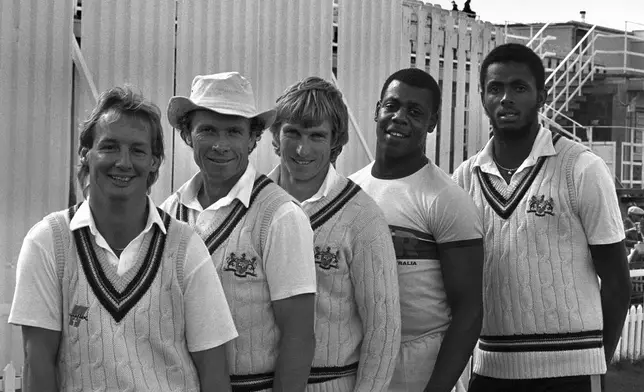 PA FILE - The five Gloucestershire cricketers from left: Jeremy Lloyds, Brian Davidson, Kevin Curran, David 'Syd' Lawrence, and Courtney Walsh pose for a picture on Sept. 5, 1985, Lawrence has died at the age of 61. (PA via AP)