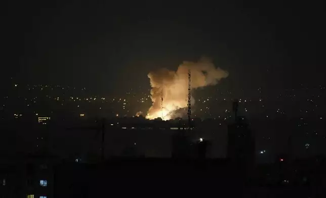 Smoke rises after an explosion in Tehran, Iran, Friday, June 13, 2025. Israel attacked Iran's capital early Friday, with explosions booming across Tehran.(AP Photo/Vahid Salemi)