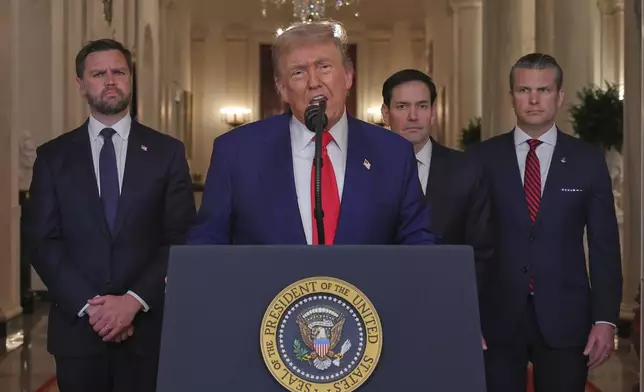 President Donald Trump speaks from the East Room of the White House in Washington, Saturday, June 21, 2025, after the U.S. military struck three Iranian nuclear and military sites, directly joining Israel's effort to decapitate the country's nuclear program, as Vice President JD Vance, Secretary of State Marco Rubio and Defense Secretary Pete Hegseth listen. (Carlos Barria/Pool via AP)