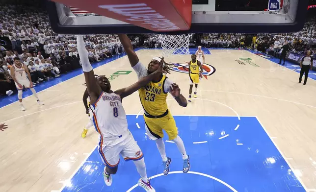 Oklahoma City Thunder forward Jalen Williams (8) shoots against Indiana Pacers center Myles Turner (33) during Game 1 of the NBA Finals basketball series Thursday, June 5, 2025, in Oklahoma City. (Matthew Stockman/Pool Photo via AP)