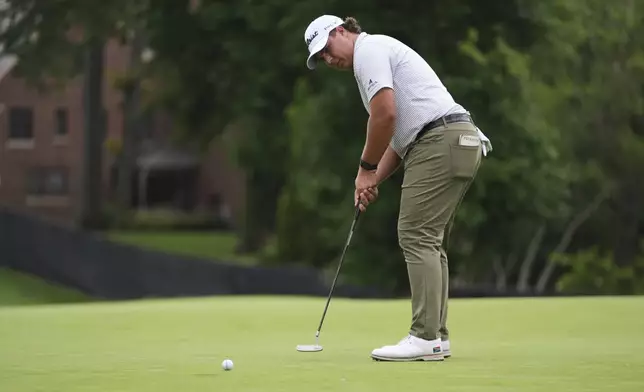 Aldrich Potgieter, of South Africa, putts on the eighth hole during the first round of the Rocket Classic golf tournament at the Detroit Golf Club, Thursday, June 26, 2025, in Detroit. (AP Photo/Paul Sancya)