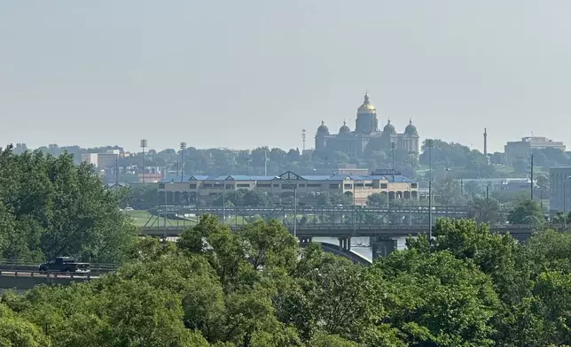 The Iowa state Capitol is seen through smoky skies due to wildfires in Canada, Wednesday, June 4, in Des Moines, Iowa. (AP Photo/Scott McFetridge)