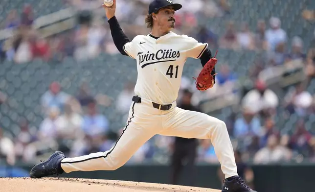 Minnesota Twins starting pitcher Joe Ryan (41) delivers during the first inning of a baseball game against the Toronto Blue Jays, Sunday, June 8, 2025, in Minneapolis. (AP Photo/Abbie Parr)