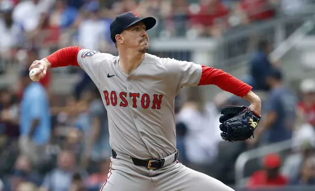 Boston Red Sox's Walker Buehler pitches during the first inning of a baseball game against the Atlanta Braves, Saturday, May 31, 2025, in Atlanta. (AP Photo/Butch Dill)