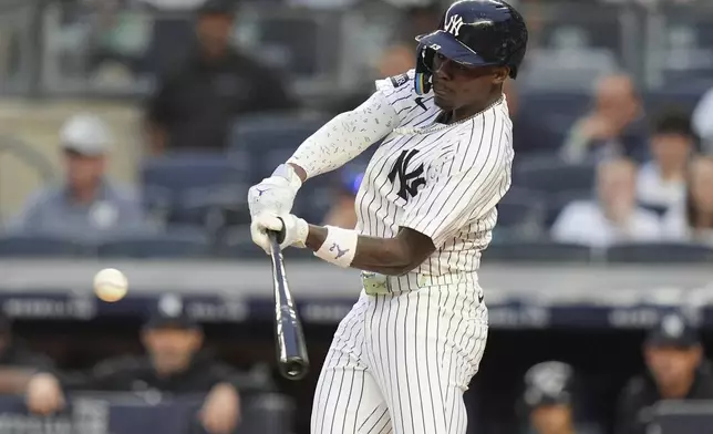 New York Yankees' Jazz Chisholm Jr. hits a home run during the second inning of a baseball game against the Athletics Friday, June 27, 2025, in New York. (AP Photo/Frank Franklin II)