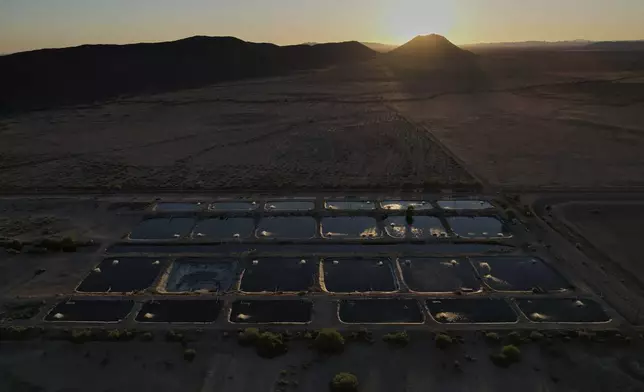 Sunlight reflects off artificial ponds Saturday, April 19, 2025, at a Mainstream USA fish farm in Dateland, Ariz. (AP Photo/Joshua A. Bickel)