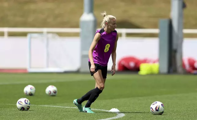 England's Leah Williamson takes part in a training session, at St. George's Park, Burton upon Trent, England, Saturday June 28, 2025. (Nigel French/PA via AP)