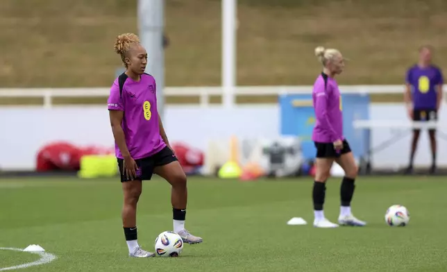 England's Lauren James takes part in a training session, at St. George's Park, Burton upon Trent, England, Saturday June 28, 2025. (Nigel French/PA via AP)