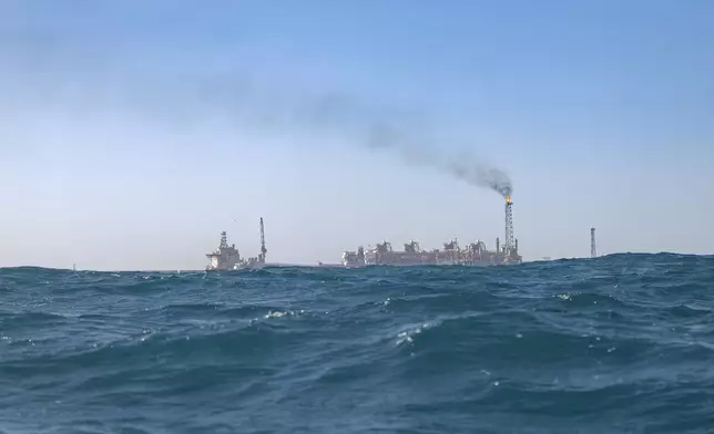 View of the Grand Tortue Ahmeyim (GTA) natural gas extraction platform located 8km from the beach Off the coast of Saint-Louis, Senegal, Thursday, March 13, 2025. (AP Photo/Sylvain Cherkaoui)