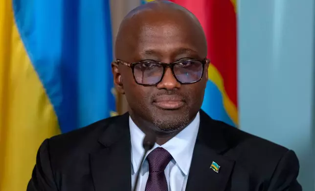Rwanda's Foreign Minister Olivier Nduhungirehe attends a signing ceremony for a peace agreement between Rwanda and the Democratic Republic of the Congo at the State Department, Friday, June 27, 2025, in Washington. (AP Photo/Mark Schiefelbein)