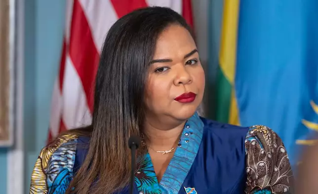 Democratic Republic of the Congo's Foreign Minister Therese Kayikwamba Wagner attends a signing ceremony for a peace agreement between Rwanda and the Democratic Republic of the Congo at the State Department, Friday, June 27, 2025, in Washington. (AP Photo/Mark Schiefelbein)