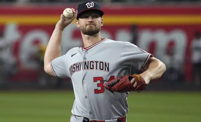Washington Nationals pitcher Michael Soroka throws against the Arizona Diamondbacks in the first inning during a baseball game, Saturday, May 31, 2025, in Phoenix. (AP Photo/Rick Scuteri)