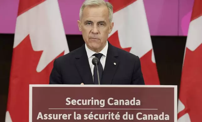Canada Prime Minister Mark Carney makes an announcement at a press conference in Toronto, Canada, on Monday, June 9, 2025. (Chris Young/The Canadian Press via AP)