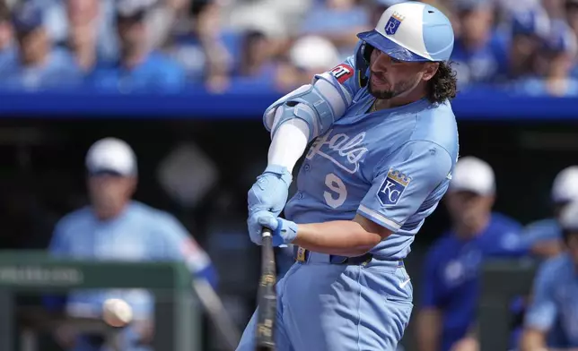 Kansas City Royals' Vinnie Pasquantino hits a two-run double during the seventh inning of a baseball game against the Los Angeles Dodgers Saturday, June 28, 2025, in Kansas City, Mo. (AP Photo/Charlie Riedel)