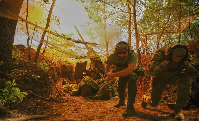 FILE - In this photo provided by Ukraine's 127th Separate Brigade of the Territorial Defense press service, soldiers fire toward Russian army positions near Kharkiv, Ukraine, on Monday, June 2, 2025. (Anatolii Lysianskyi/Ukraine's 127th Separate Brigade via AP, File)