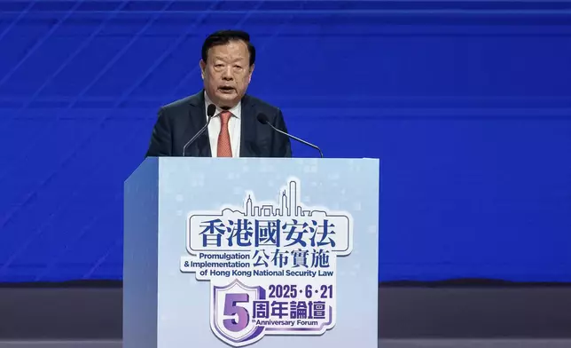 Xia Baolong, director of Hong Kong &amp; Macao Affairs Office, speaks at the 5th anniversary of Hong Kong National Security Law Forum in Hong Kong, Saturday, June 21, 2025. (AP Photo/Chan Long Hei)