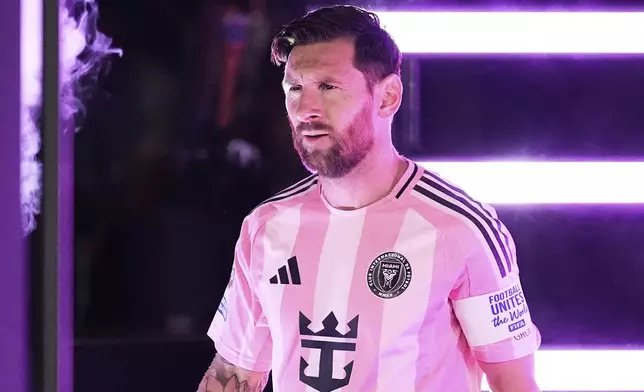 Inter Miami's Lionel Messi enters the field before the Club World Cup round of 16 soccer match between PSG and Inter Miami in Atlanta, Sunday, June 29, 2025. (AP Photo/Brynn Anderson)