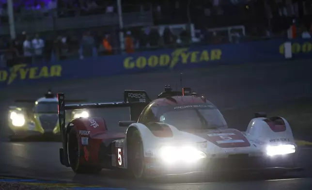 Porsche Penske Motorsport car (starting no. 5) a Porsche 963 with Julien Andlauer of France, Michael Christensen of Denmark and Mathieu Jaminet of France races during the 24-hour Le Mans endurance race, Saturday June 14, 2025 in Le Mans, western France. (AP Photo/Jeremias Gonzalez)